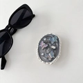Detail of oval butterfly phone grip with iridescent rhinestones and faux pearls - Cloud Flash Butterfly Grey
