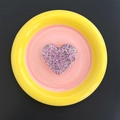 Detail of a heart-shaped glitter phone socket with sparkling pink and purple sequins - Heart / Gray