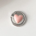 Close-up of a pink heart-shaped phone ring holder with a polished silver metal base - Thin Heart / Dusty Pink