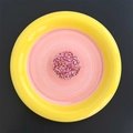 Close-up of heart-shaped glitter inside a yellow and pink telescopic phone socket - Round / Rose Red