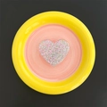 Macro shot of heart-shaped glitter phone grip with iridescent sequins in clear resin - Heart / White