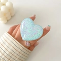 Close-up of heart-shaped glitter phone socket with blue-green sequins on a white background - Transparent Stand - 3D Heart - Blue Dots