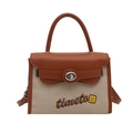 Bolso Kelly retro bandolera con colores en contraste y costuras de lona y cierre giratorio - Marrón