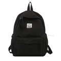 Minimalistischer schwarzer Damenrucksack aus Nylon mit Smiley-Logo und Vordertasche - Schwarz
