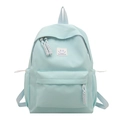 Minimalistischer minzblauer Rucksack mit modischem Smile-Patch und gewebtem Schlüsselband - Blau