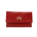 Red crocodile pattern PU leather clutch bag with a golden metal bow accessory - Red
