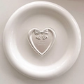 Detail of silver heart phone socket with bow and happy engraving on white plate - Transparent Pop-up Stand - Silver Heart Bow