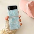 Close-up of blue pearlescent Z Flip case with iridescent 3D butterflies and floral patterns - Matte Hard Shell Style / Blue / Samsung Z Flip 3