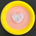 Close-up of heart-shaped phone grip filled with colorful pink and white sequins - Candy Heart - White