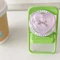 Detail of purple heart phone grip with silver bow and 'Gift For You' text on base - Pearl Purple