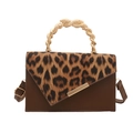 Leopard print crossbody bag with asymmetric flap and twisted gold metal handle design - Brown