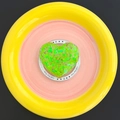 Macro detail of heart-shaped MagSafe phone grip with vibrant neon green glitter sparkles - Green
