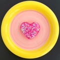 Close-up of pink glitter heart phone socket with sparkling sequins and resin finish - Candy Heart - Rose Red