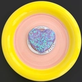Detail showing heart-shaped Magsafe grip with purple and green sequins inside - Purple