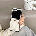 Close-up of woven fabric phone case with leather hand strap for Samsung Z Flip 6 - Silver Label Faux Shell Ring - Off-White / Samsung ZFlip3