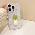 Detail of silver glitter phone case with green heart stand and hand strap for iPhone - Light Green / iPhone 7/8/SE 2020