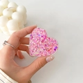 Macro detail of pink glitter heart phone grip with sparkling sequins and resin finish - Colorful Glitter Heart No. 9