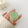 Detailed view of hand-held round green glitter phone grip with sparkling sequins - Green Gold Round Rhombus Sequin Style (11)