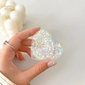 Detail of heart-shaped glitter phone grip with iridescent sequins held in hand - Colorful Glitter Heart No. 14
