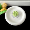 Macro view of a cute green cat paw phone socket on a white base - Magnetic Stand / Dark Green