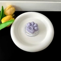 Detailed view of a cute purple 3D cat paw phone grip featuring a heart motif design. - Magnetic Stand / Purple