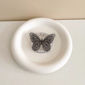 Detailed macro view of black and white mandala butterfly acrylic phone socket stand - Lace Butterfly-Black