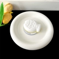 Macro shot of a fish-shaped gift ornament in a ceramic dish with Gift For You card tray - Magnetic Stand - Two-tone Fish / White