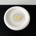 Macro shot of glitter heart phone socket with silver sequins on a white gift display card - Gradient Yellow (Heart Style)