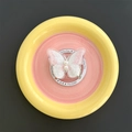Detailed view of pink embroidered butterfly phone stand with pearls on gift packaging - Magnetic Stand / White