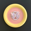 Detail of butterfly phone grip with pink gradient embroidery and white pearls on a tray - Magnetic Stand / Purple