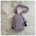 Macro detail of lavender nylon chest bag with vertical zipper and durable texture - Purple