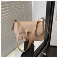 Detail of light beige crossbody bag with gold metallic twist lock and smooth leather texture - Khaki