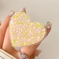Pink and yellow glitter heart phone grip holder with sparkling sequins on white background - Pink and Green