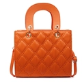 Bright orange quilted shoulder bag with gold hardware and top handle on white background - Orange