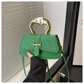 Grüne Handtasche mit Stoffoberfläche, goldenem Griff und H-förmigem Metallverschluss - Grün