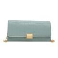 Light blue stone texture shoulder bag with golden lock and chain strap on white background - Lake Blue