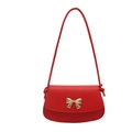 Borsa a tracolla minimalista in pelle rossa con fibbia a fiocco d'oro e tracolla annodata - Rosso