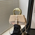 Beige leather and fabric handbag with a unique gold metal handle and H buckle detail - Khaki