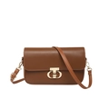 Detail shot of the vintage brown crossbody bag featuring a golden metal twist lock closure - Brown