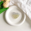 Dettaglio del supporto per telefono a cuore con glitter sfumati oro e argento lucido - Cuore Sfumato Giallo (Glitter Argento)