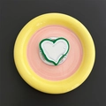 Macro detail of Magsafe phone grip with heart-shaped makeup mirror on yellow acrylic base - Dark Green