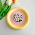 Detail of heart-shaped MagSafe phone socket with Best Wishes label and polka dot pattern - Black Polka Dot