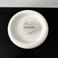Silver heart-shaped mirror grip with fine brushed texture on a white ceramic plate - Transparent Grip-Glitter Heart Mirror