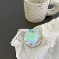 Detail of holographic turtle phone grip with iridescent finish and gift text on base - English Gift Magnetic Grip - Laser Bubble Turtle - Rainbow Laser