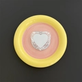 Macro shot of glittery heart-shaped MagSafe phone stand with mirror and Gift For You text - Silver