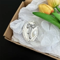Detailed view of elegant silver embossed bowknot phone grip holder on soft tissue paper - Oval Glitter Ribbon Bow