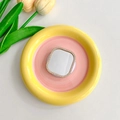 Close-up of a rhinestone-bordered mirror phone socket on a pastel ceramic plate - Square Mirror Magnetic (Gold)