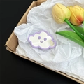 Close-up detail of the cute purple cloud mirror phone stand in gift packaging boxes - Light Purple