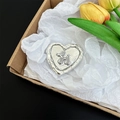 Macro detail of heart-shaped silver phone socket with a rhinestone balloon dog - Heart Outline Glitter Rhinestone Puppy