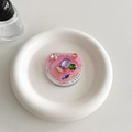 Macro shot of heart-shaped phone grip featuring colorful rhinestones and pink resin base - Magnetic Colorful Gem Heart (Transparent Pink)